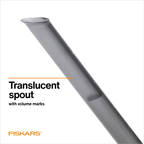Fiskars can showing translucent spout with volume markings for accurate watering.