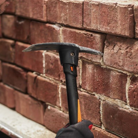 Fiskars IsoCore dual-use tool handles roots and rocks effectively