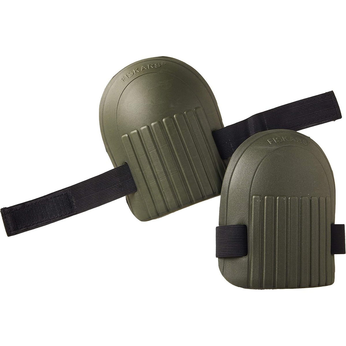 Fiskars knee pads with durable outer shell protecting knees on rough garden surfaces.