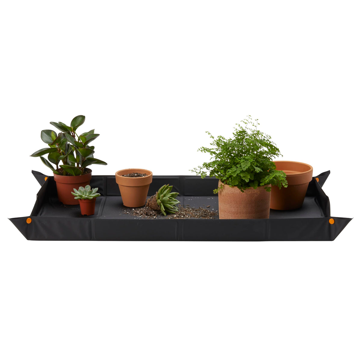 Fiskars Large Repotting Mat unfolded to full size for ample workspace during potting
