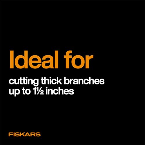 Fiskars loppers in-action garden-tool demonstrate precise cuts in the yard.