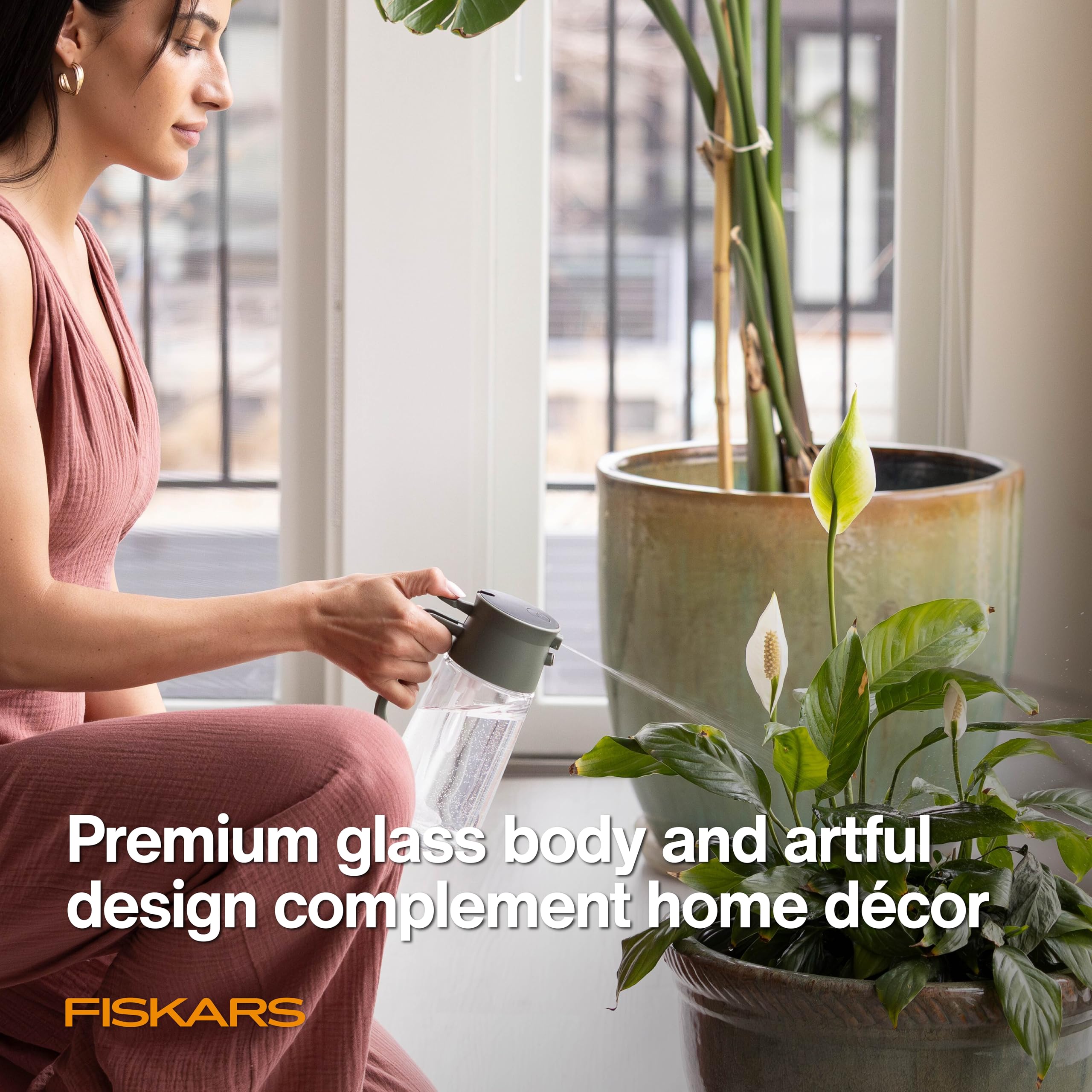 Fiskars ergonomic handle provides secure control during misting and pouring.