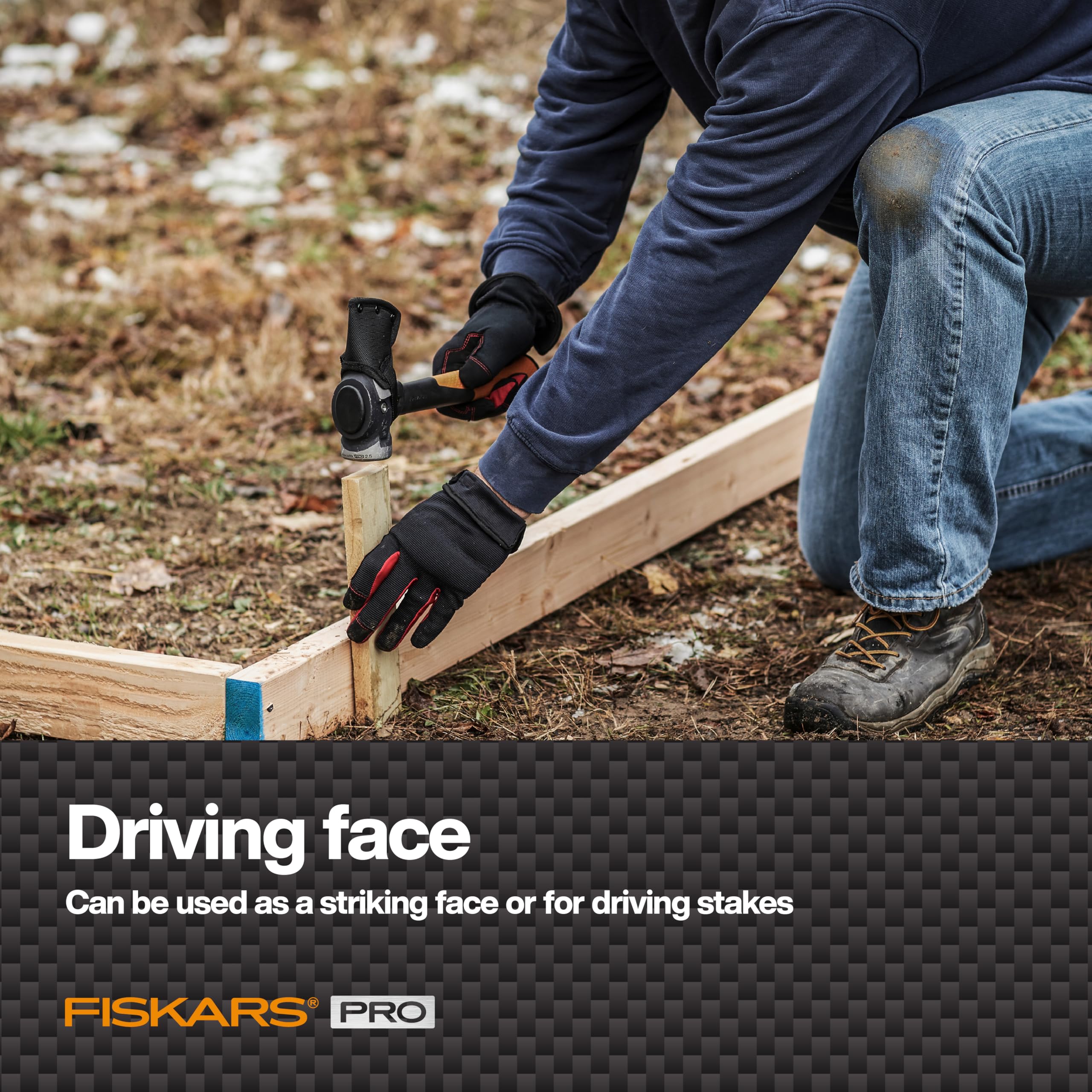Fiskars Pro IsoCore Maul wood-splitting action in a rugged outdoor setting
