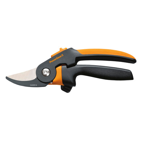 Fiskars pruner in hand showing ergonomic design for easy pruning.