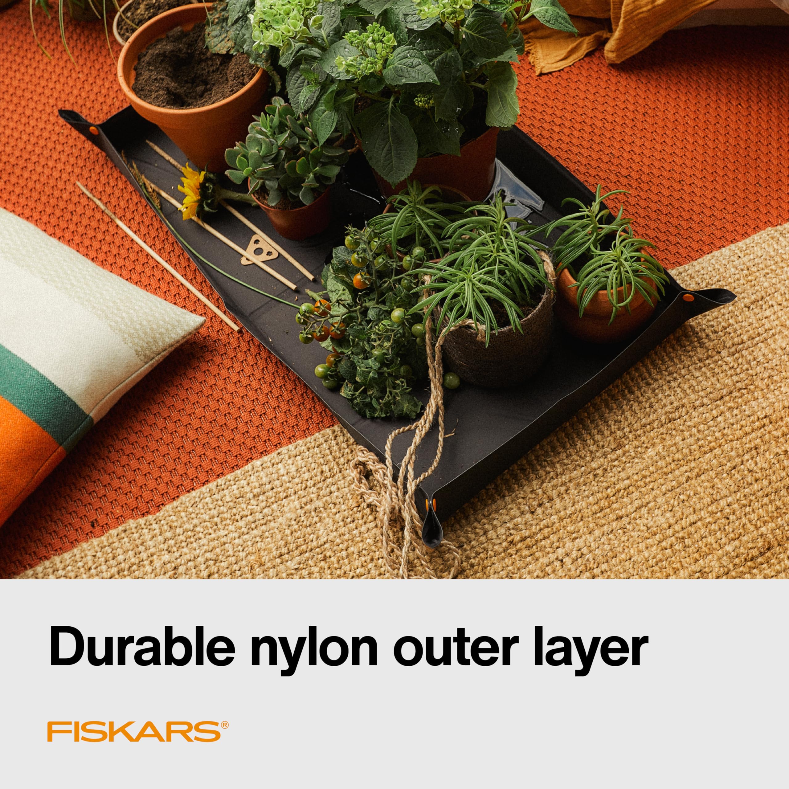 Fiskars Repotting Mat folded for compact storage after gardening sessions