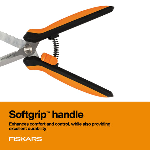 Fiskars sheath attached, ready for safe garden storage.