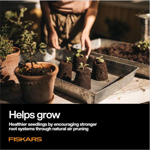 Fiskars soil block top-hole focus enables quick seed placement