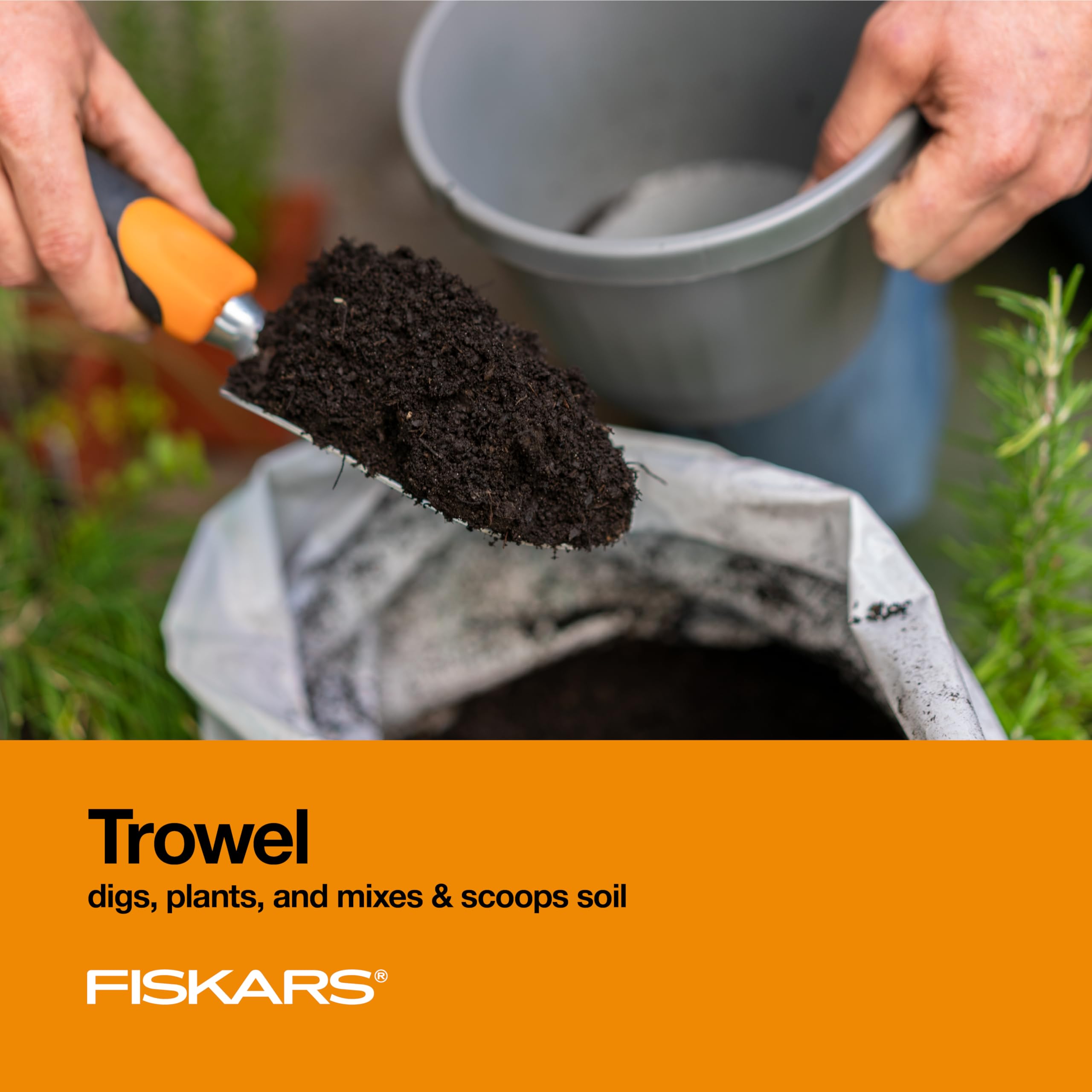Fiskars Transplanter for clean, accurate seedling transplanting.