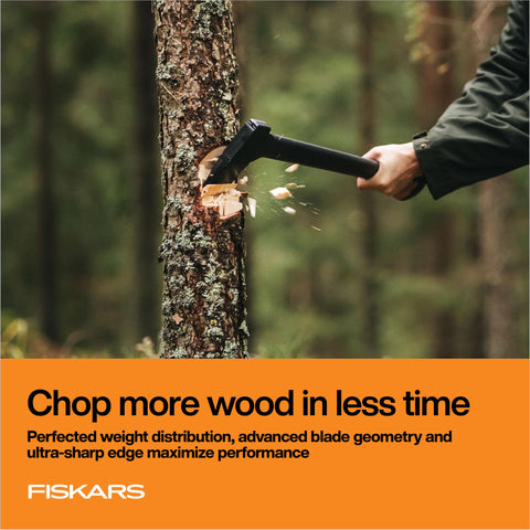 Fiskars wood log being split with the chopping axe.