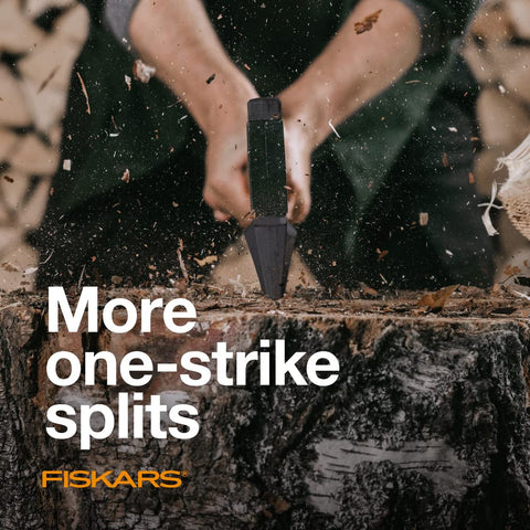Fiskars X11 camping setting splitting kindling by a campfire