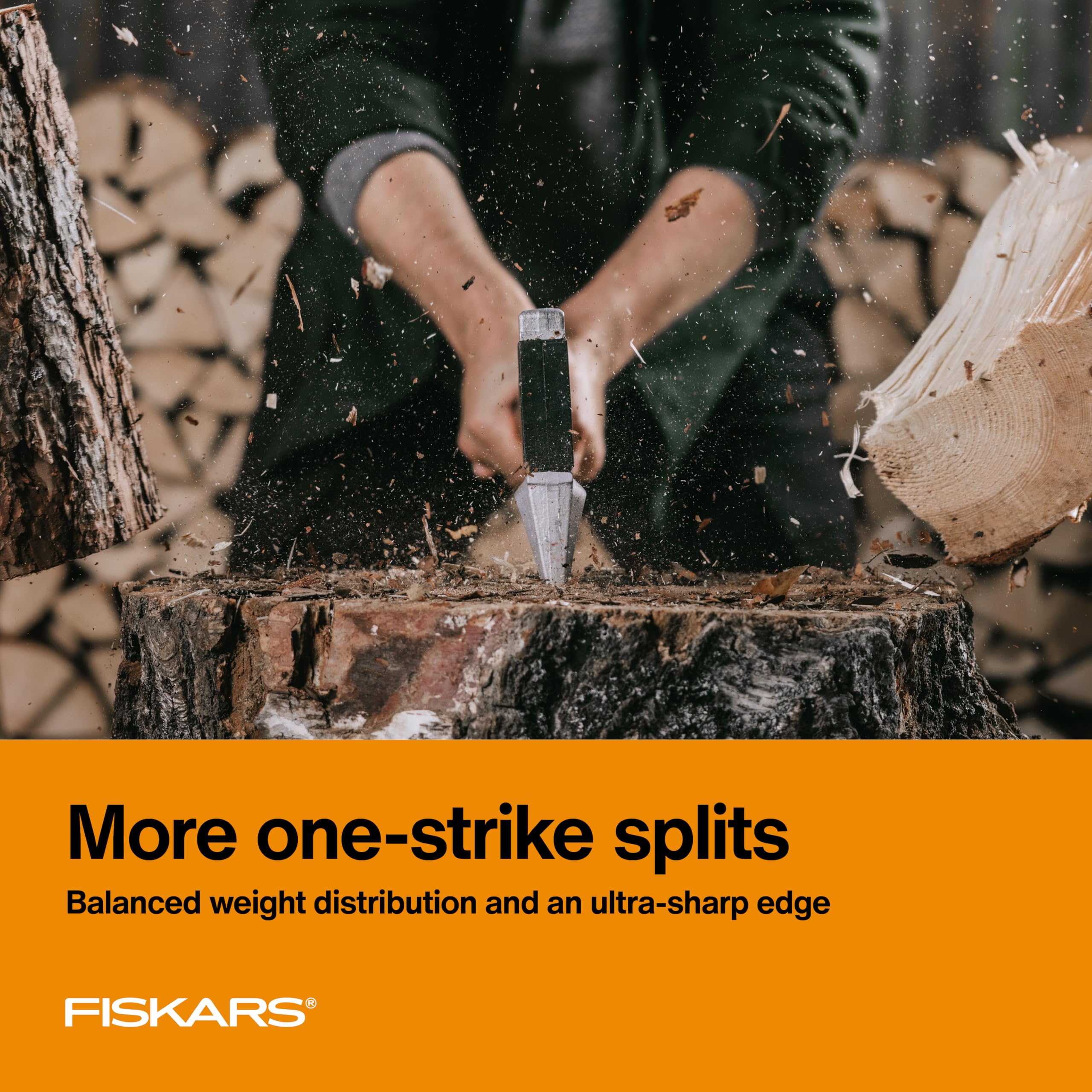 Fiskars X27 36-inch handle grip emphasizes shock absorption during heavy chopping.