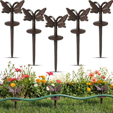 Fiwochic butterfly hose guide stake in rusty finish protecting plants while guiding the hose.