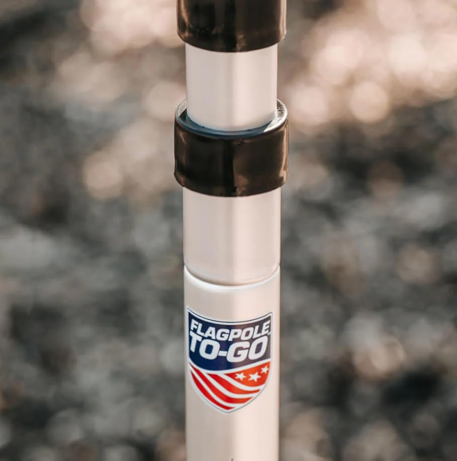 Flagpole-To-Go with two flags clipped for versatility at events.