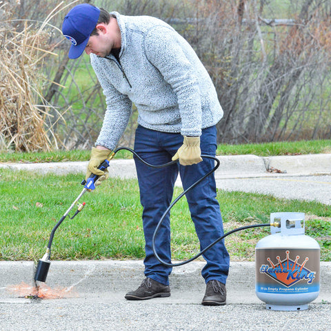 Flame King removes pavement markings and paint efficiently.