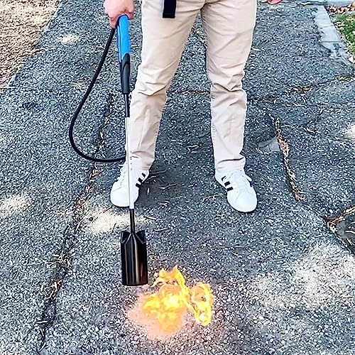 Flame King torch removing paint from pavement surfaces