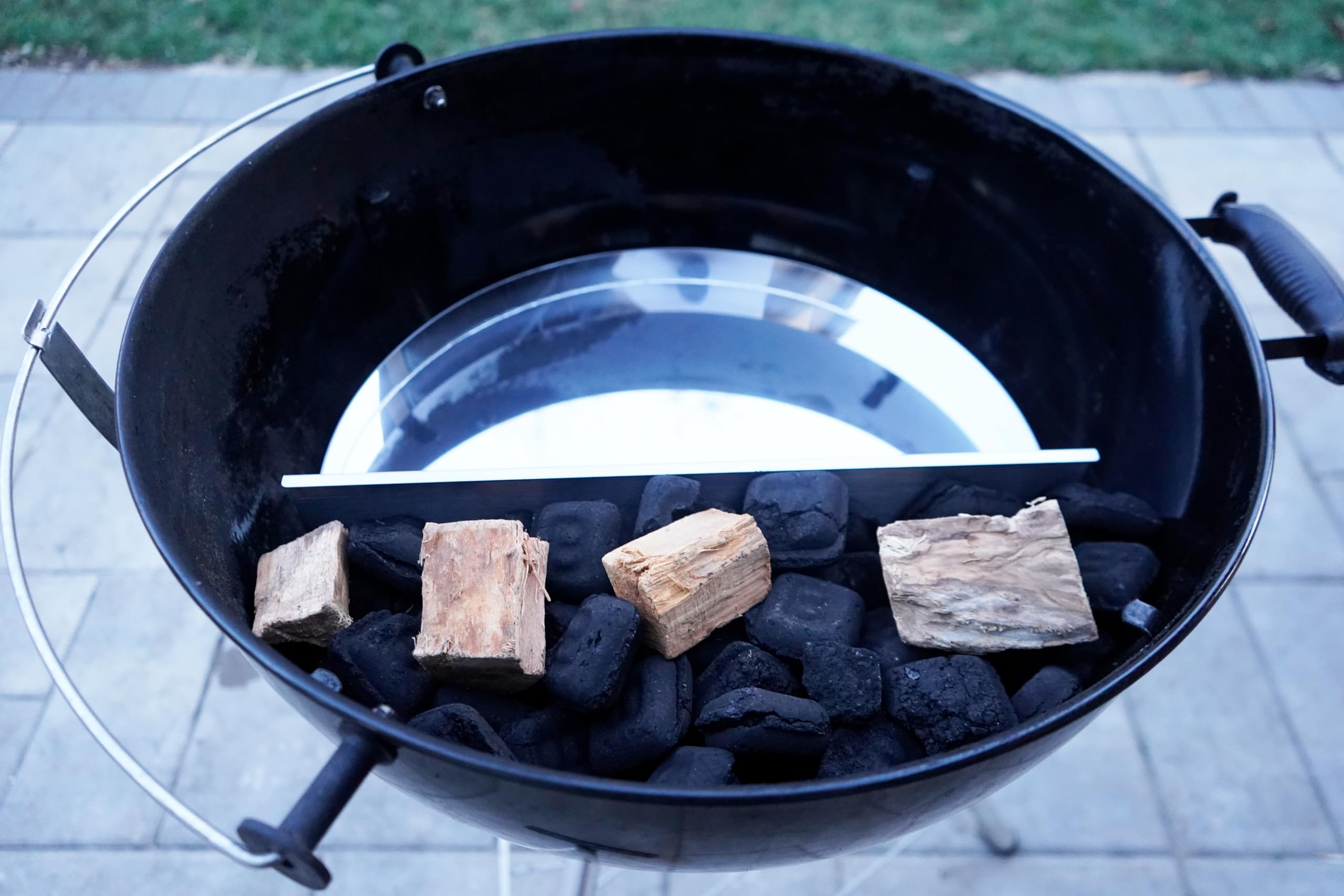 FlameTechGrills offset-smoker-inside design redirects airflow for even cooks.