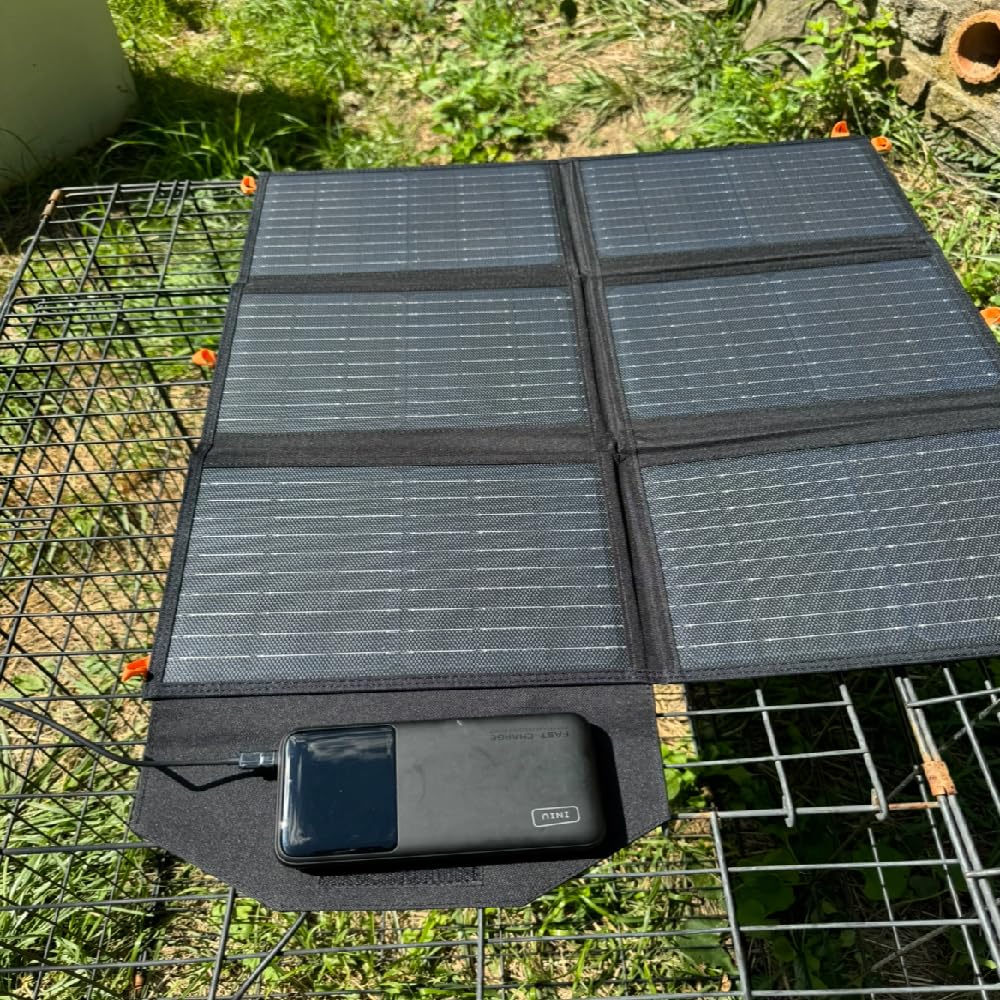 FlexSolar 60W IP65 waterproof panel withstands rain during camping