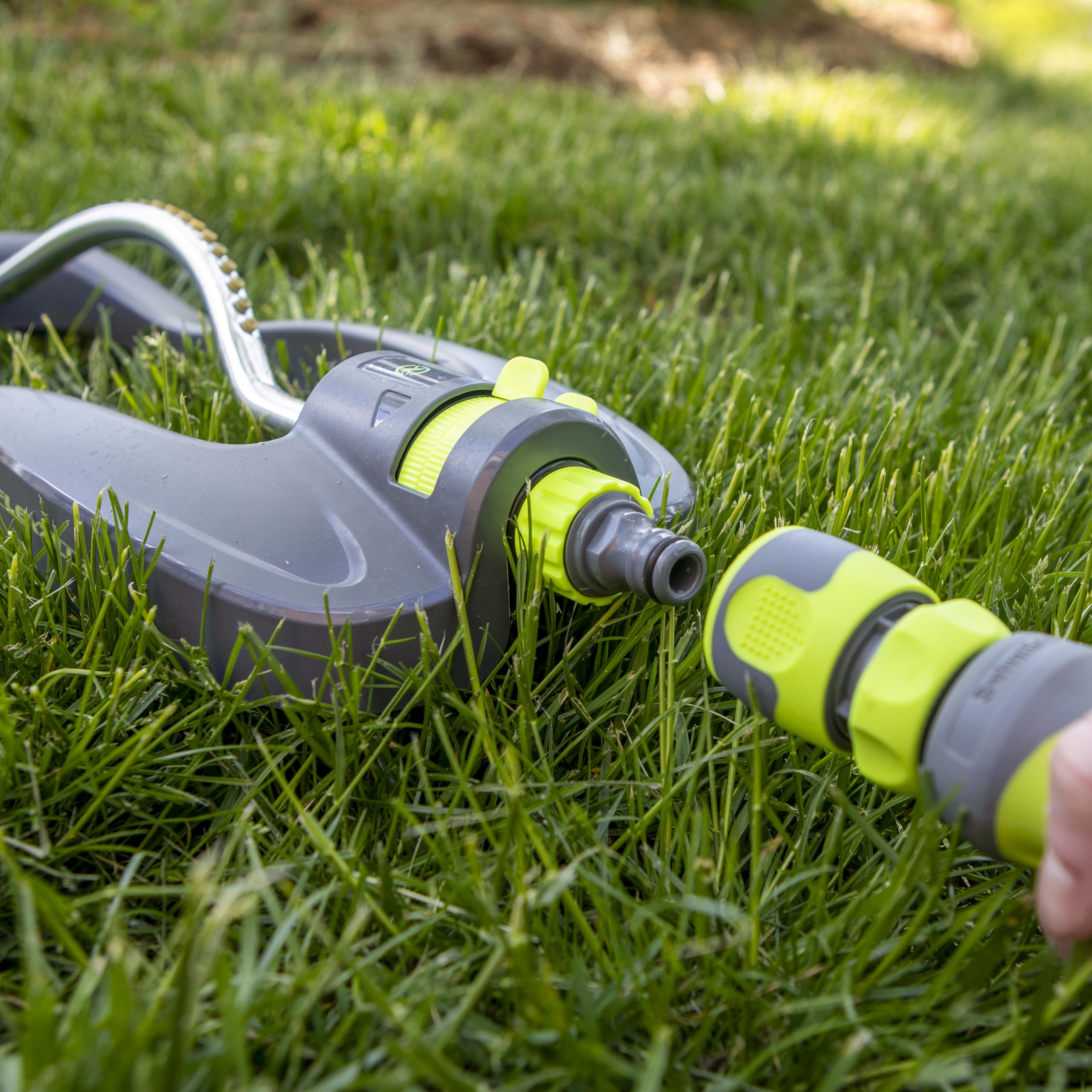 Flexzilla in ZillaGreen color complements garden tool setups.