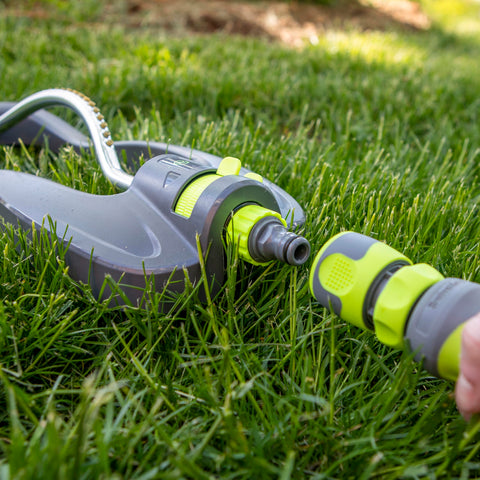 Flexzilla in ZillaGreen color complements garden tool setups.