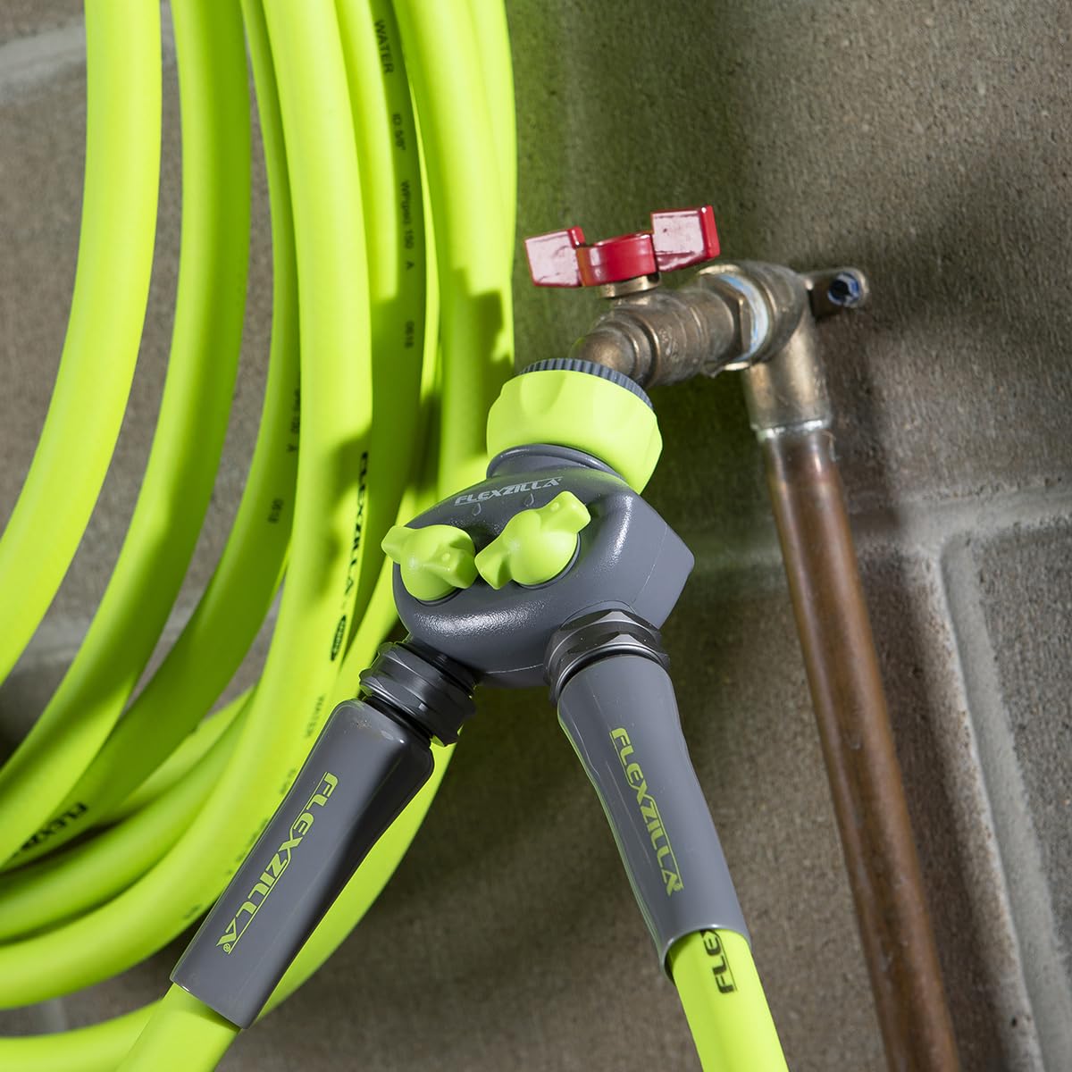 Flexzilla green-gray colorway on hose splitter for durable outdoor use.
