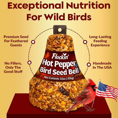 Birds mid-feeding on the Flockin' Hot Pepper Bird Seed Bell in a tree.