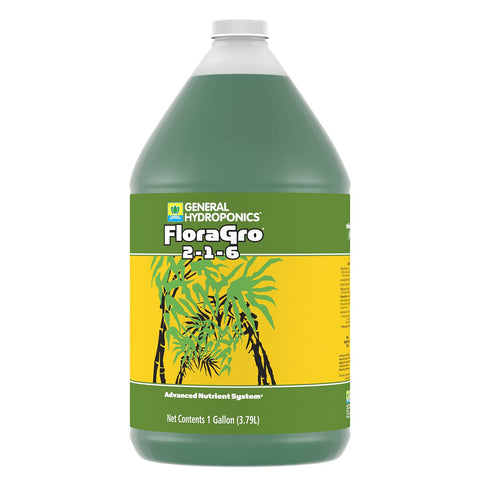 Pouring FloraGro bottle for precise nutrient feeding.