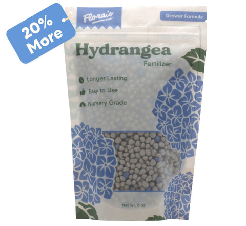 Flora's Market Hydrangea Fertilizer applied around the root zone for all-season feeding