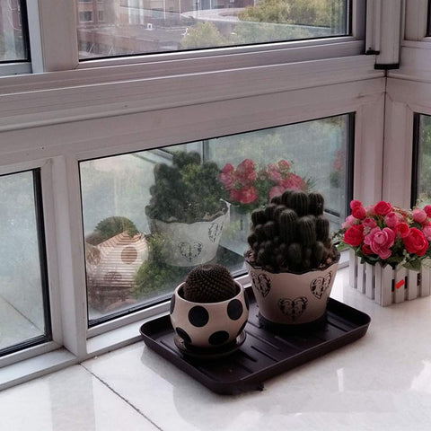 Flowerting-multipurpose-shoe-mat-tray adapts for boots, pets, or paint trays.
