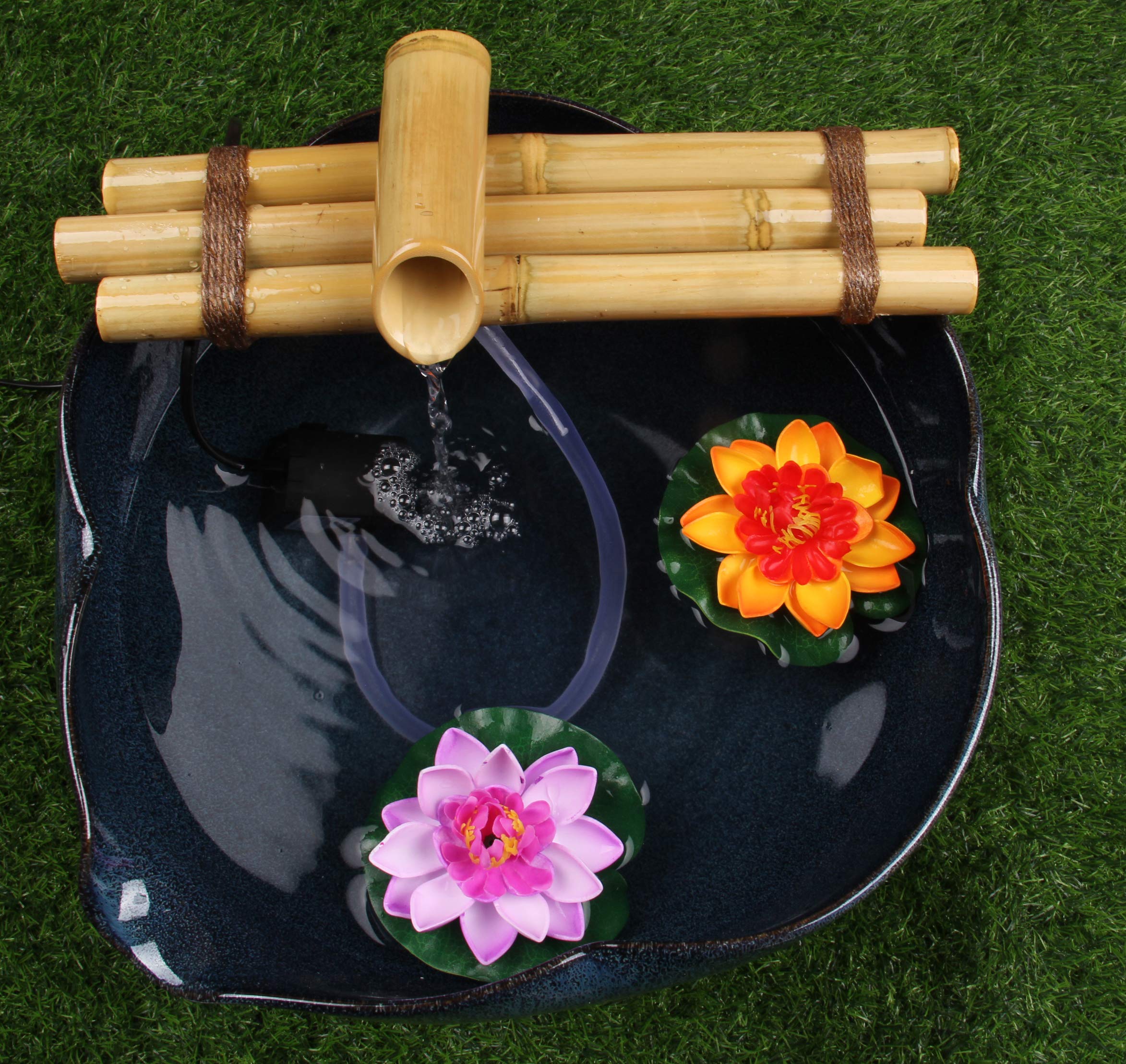 Indoor/outdoor decor with bamboo fountain for versatile use.