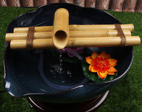 DIY fountain with natural bamboo material for a warm, organic look.