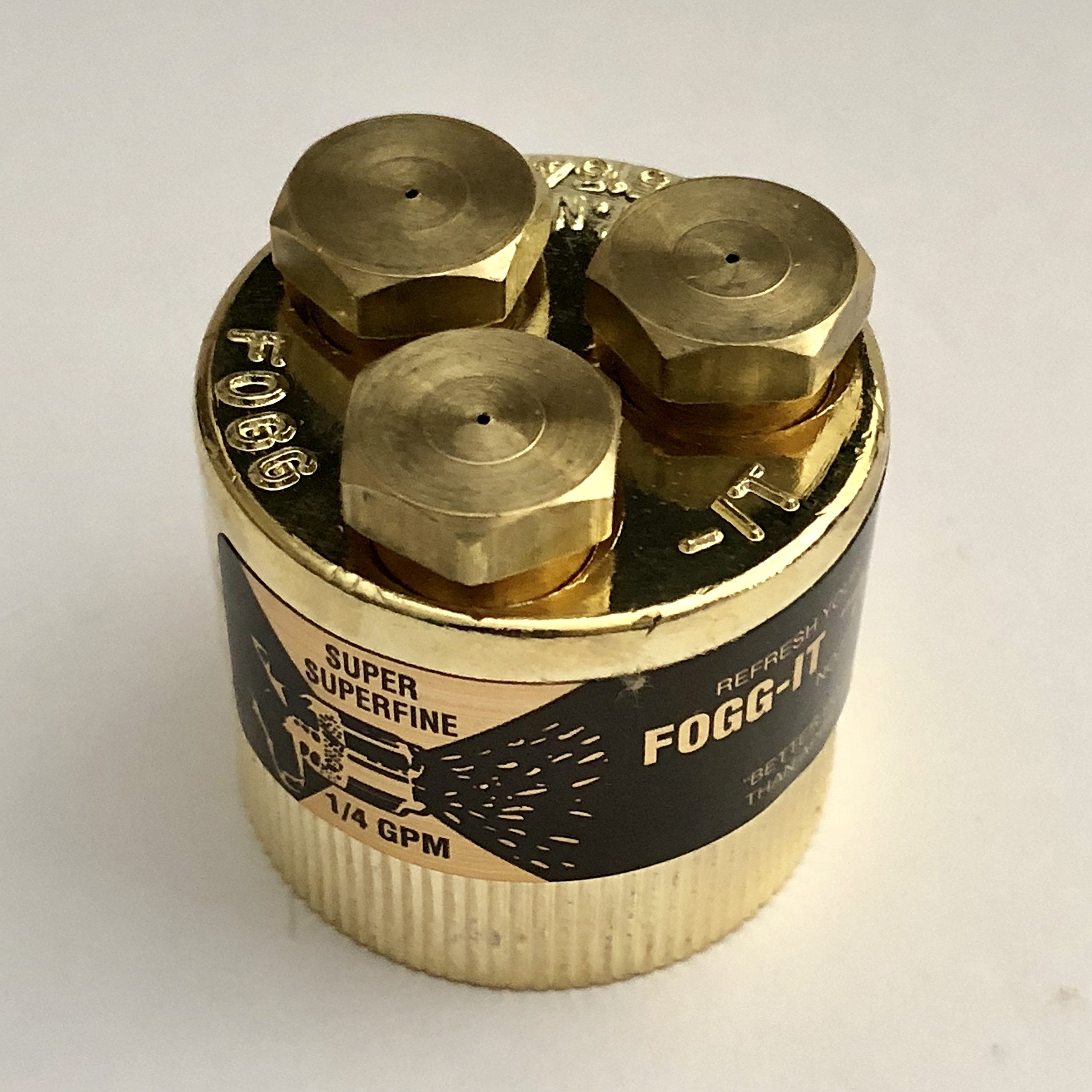 Fogg-It Nozzle showing conical mist pattern for seedling hydration and coverage