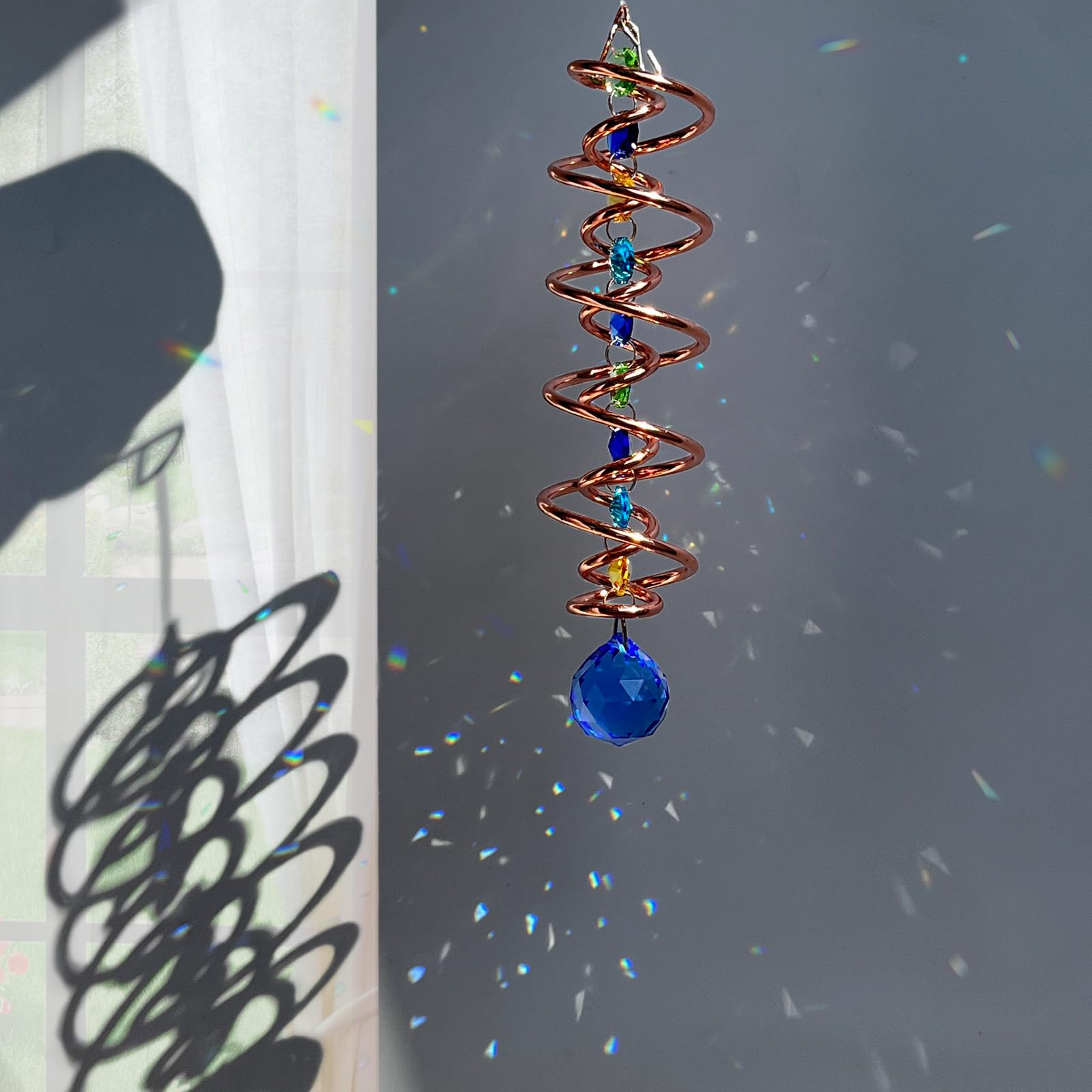 FONMY suncatcher wind spinner creates eye catching effect in sunny outdoor spaces