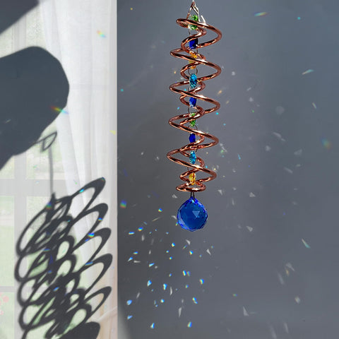 FONMY suncatcher wind spinner creates eye catching effect in sunny outdoor spaces