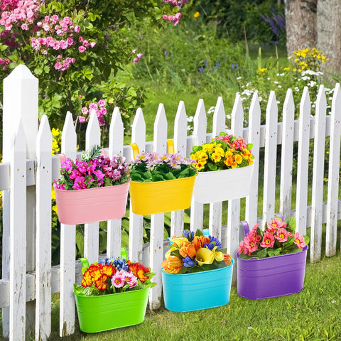 Foraineam green hanging pots blend with natural spaces and drainage.