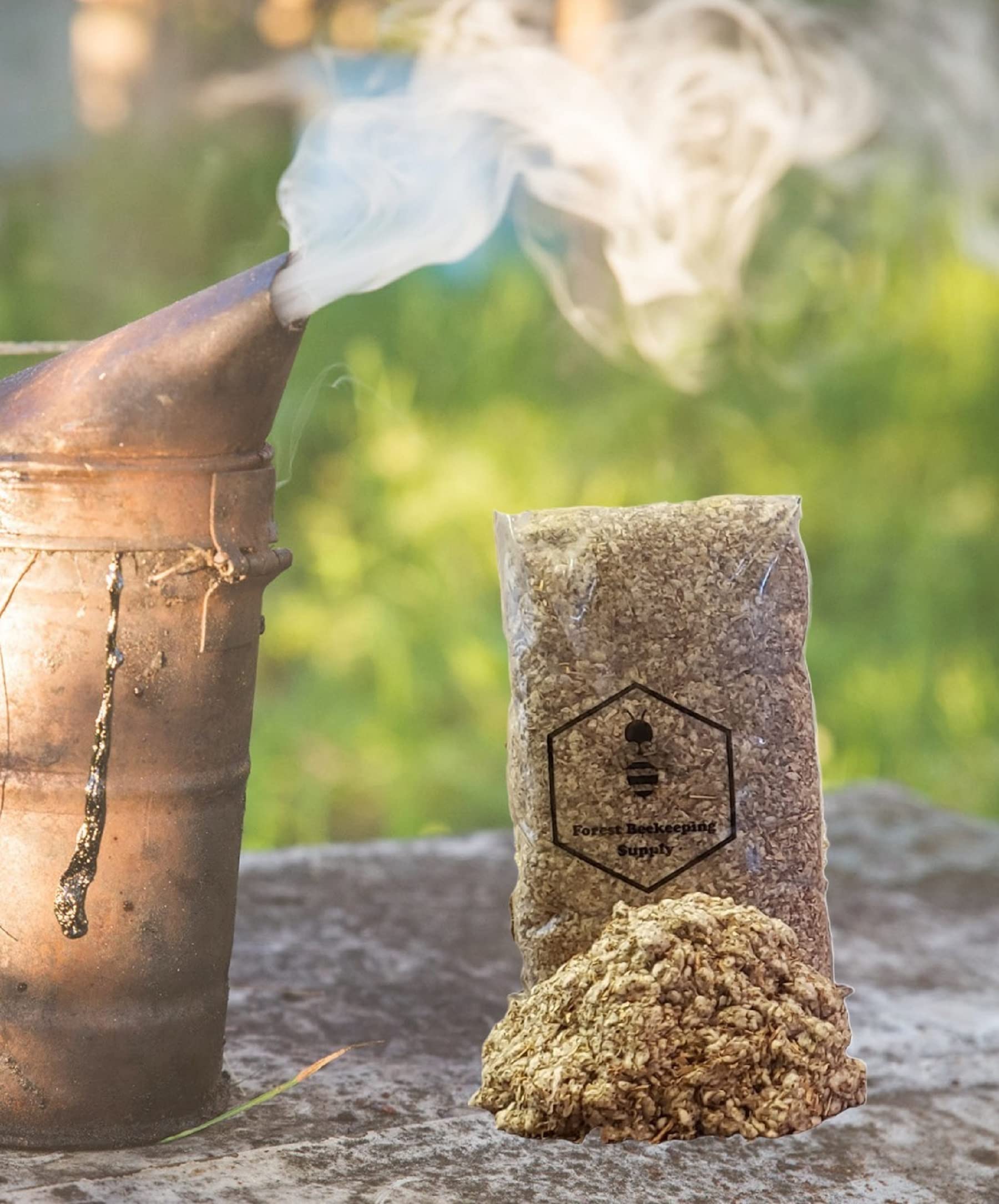 FOREST BEEKEEPING SUPPLY hive smoker fuel scene shows easy ignition with a match.