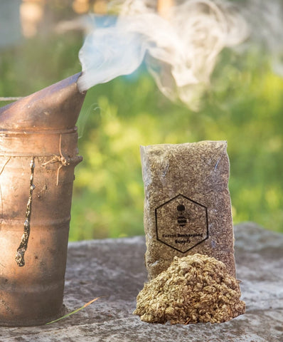 FOREST BEEKEEPING SUPPLY hive smoker fuel scene shows easy ignition with a match.