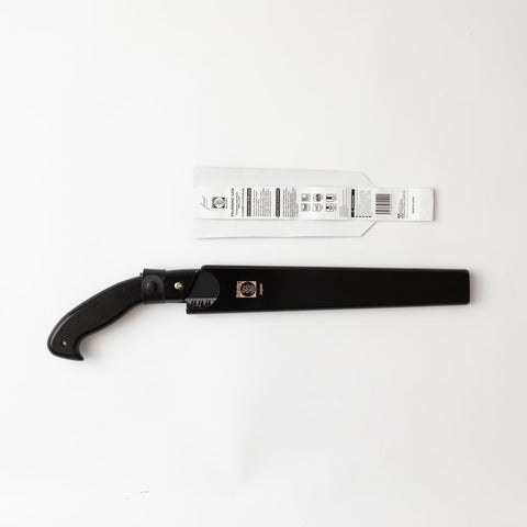 Saboten pruning saw with wooden sheath supports secure storage and protection.