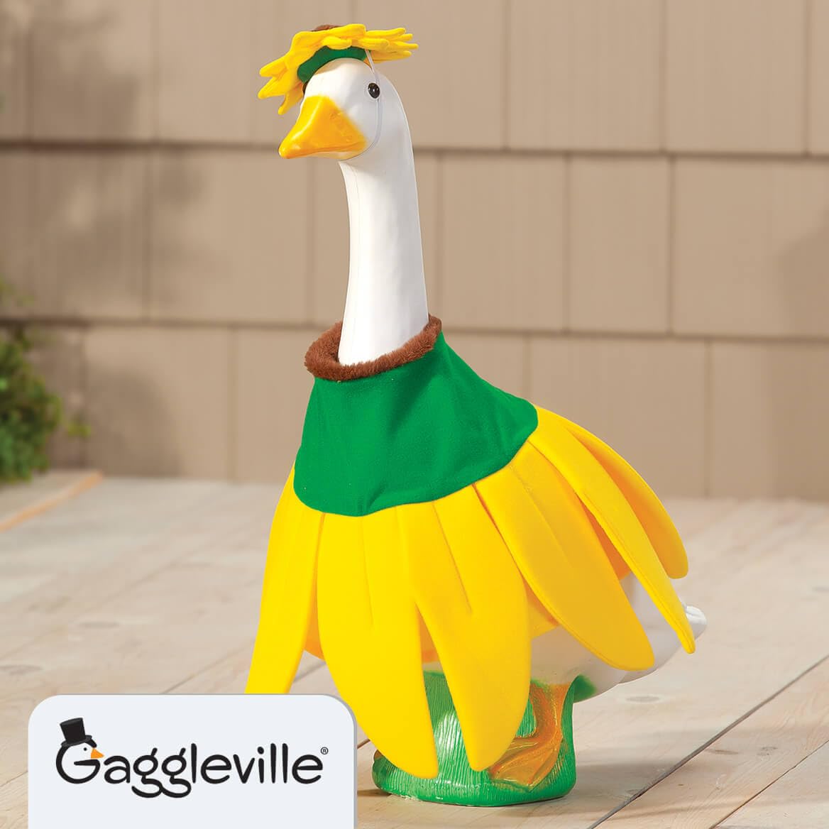 Gaggleville sunflower goose hat detail enhances sunny porch decor.