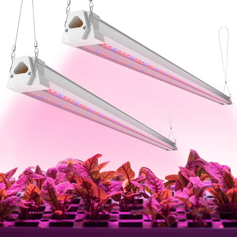 FREELICHT 2-pack 4ft LED grow light panel illuminating seedlings with full spectrum.