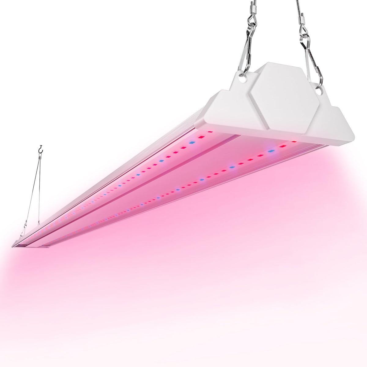 FREELICHT 4ft LED Grow Light mounted above a plant bench for compact indoor gardening