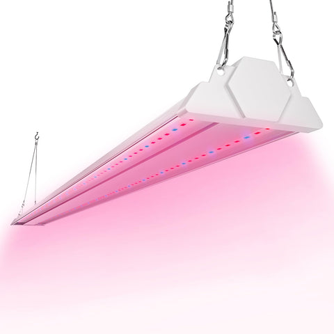 FREELICHT 4ft LED Grow Light mounted above a plant bench for compact indoor gardening