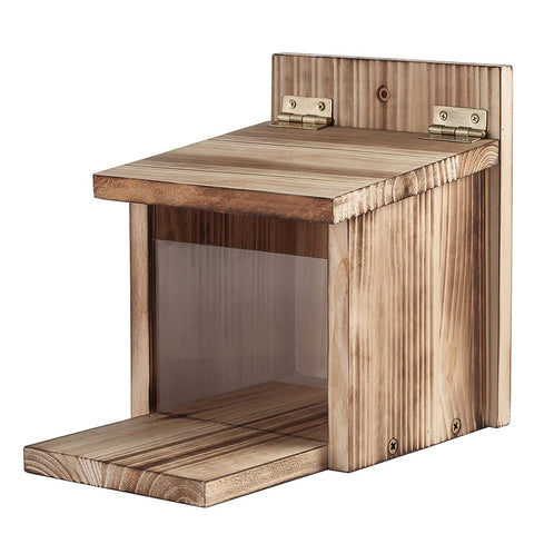 Freezing Point wooden squirrel feeder in picnic-table design invites year-round backyard visits.