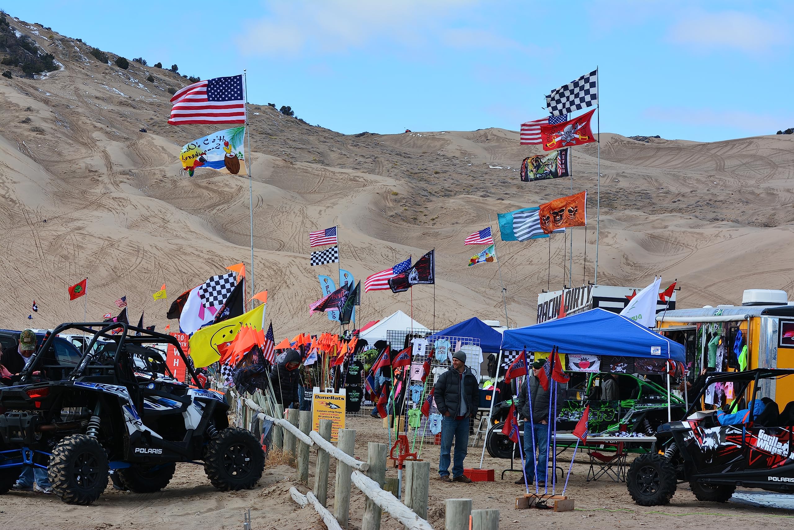 FRF flag outdoors against blue sky shows weather resistance and long-lasting color