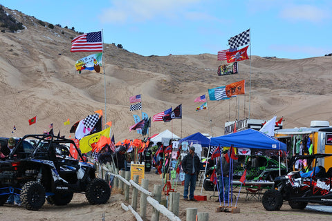 FRF flag outdoors against blue sky shows weather resistance and long-lasting color