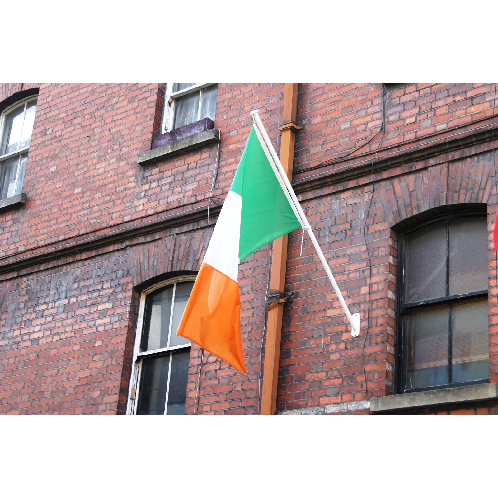 FRF FLAG Irish flag fluttering in wind, ideal for outdoor display.