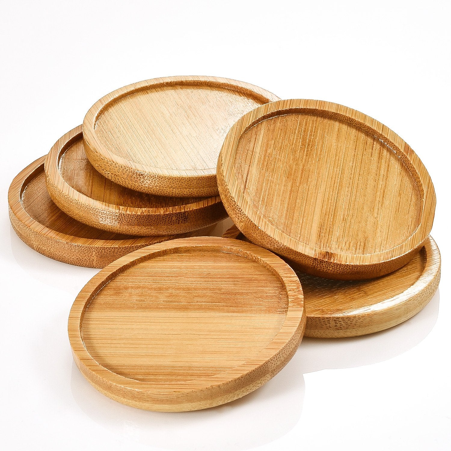 Frienda bamboo plant saucer side view shows smooth finish and raised edge.