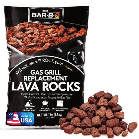 FryOilSaver lava rocks in fire pit setup for even heat distribution and safer flame control.