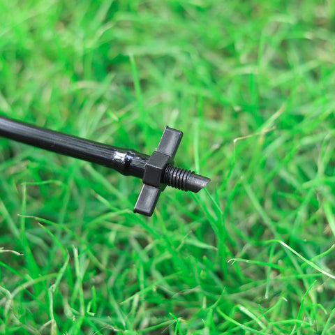 FULAIERGD dual-end connector in use for barbed drip line and PVC pipe.