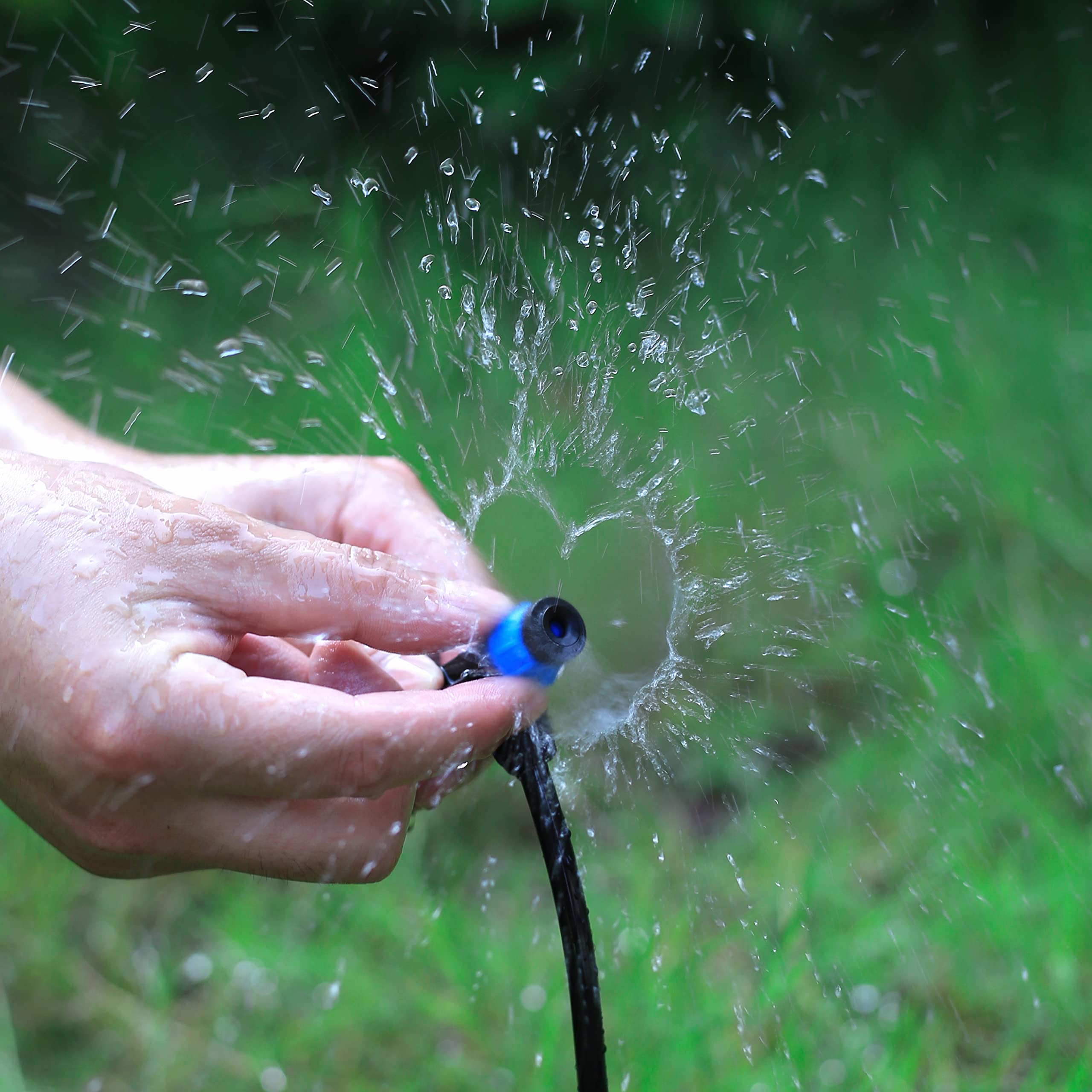 Close-up of adjustable flow cap enabling 0 to 10 feet spray diameter.