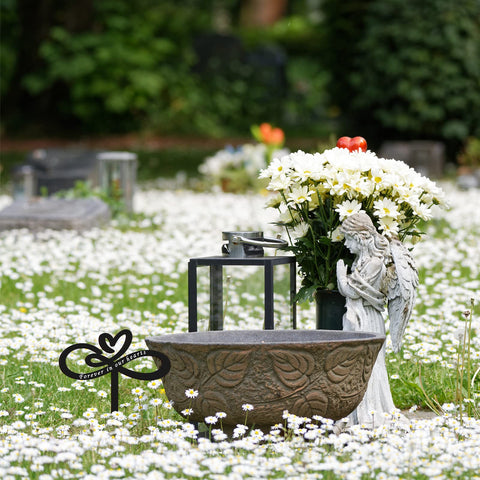 Fumete rustproof memorial stake outdoors against a light background